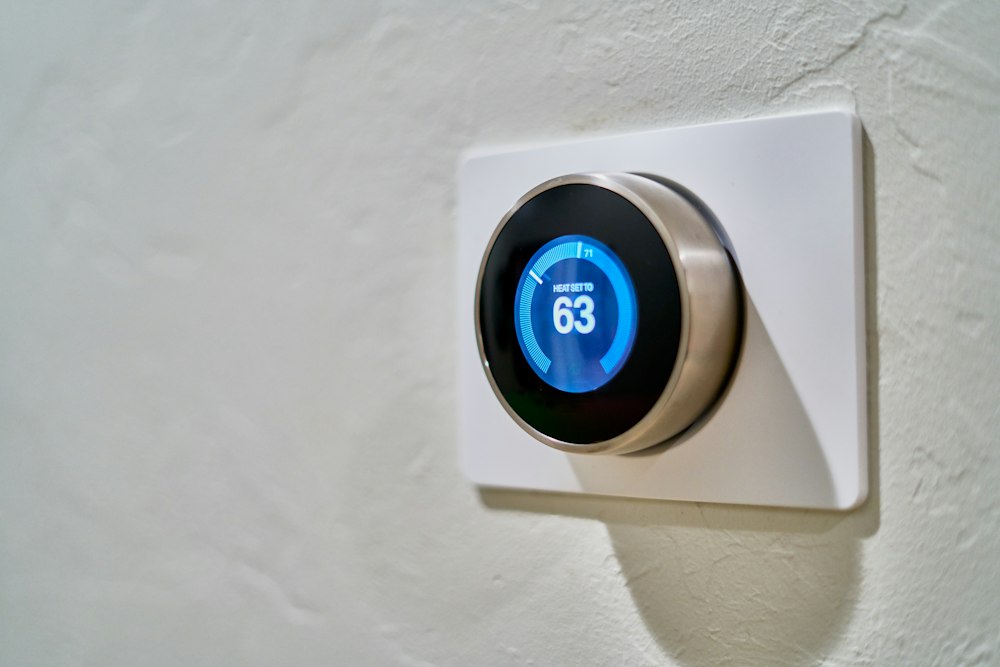 Modern thermostat on a wall